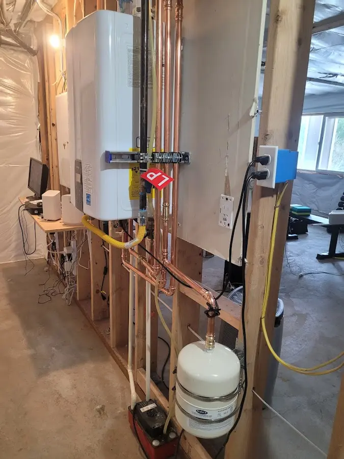 Licensed plumber repairing a kitchen sink in Pacific